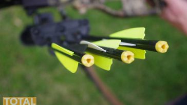 shooting deer with bow and arrow